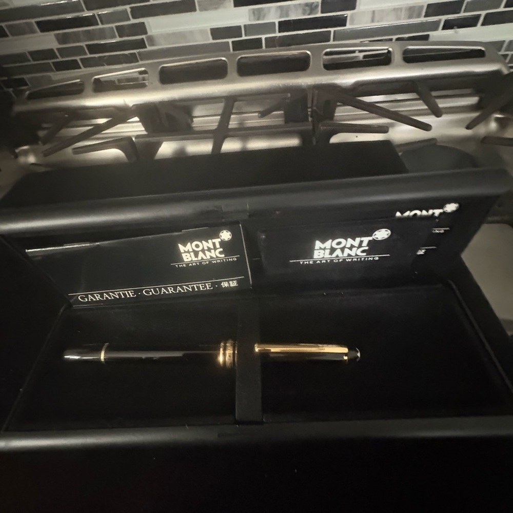 Montblanc Black and Gold Rollerball Pen with Presentation Box